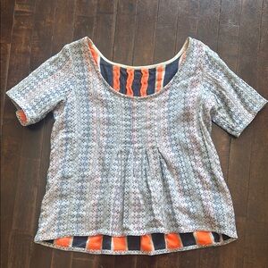 Ace and jig reversible top